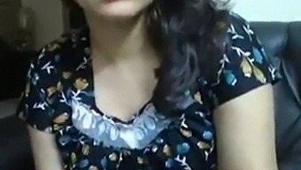 Indian Mature Woman With Large Breasts Chatting With Her Partner On Camera